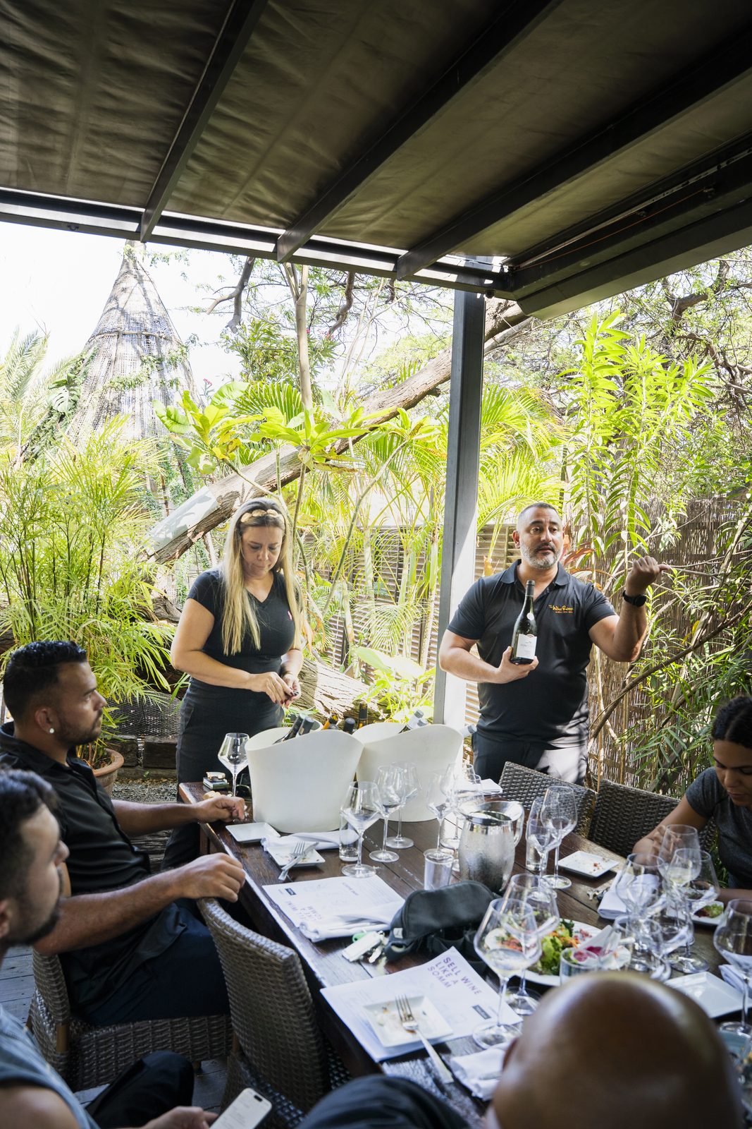 A Corvia session on selling wine, held on a restaurant terrace