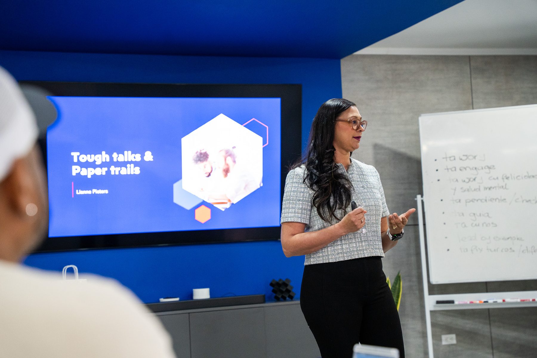 A facilitator presenting a training session